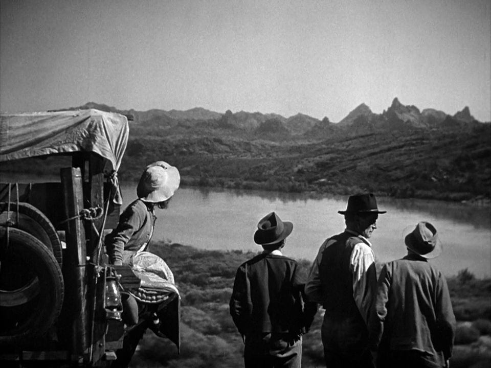 Ford's use of wide spanning shots is reminiscent to his western work.